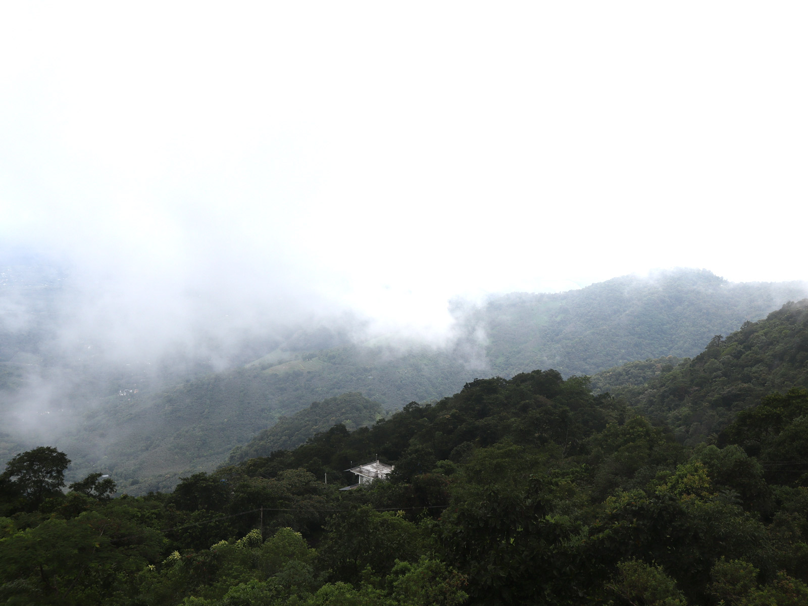 Balcony view of the cloudy mountains